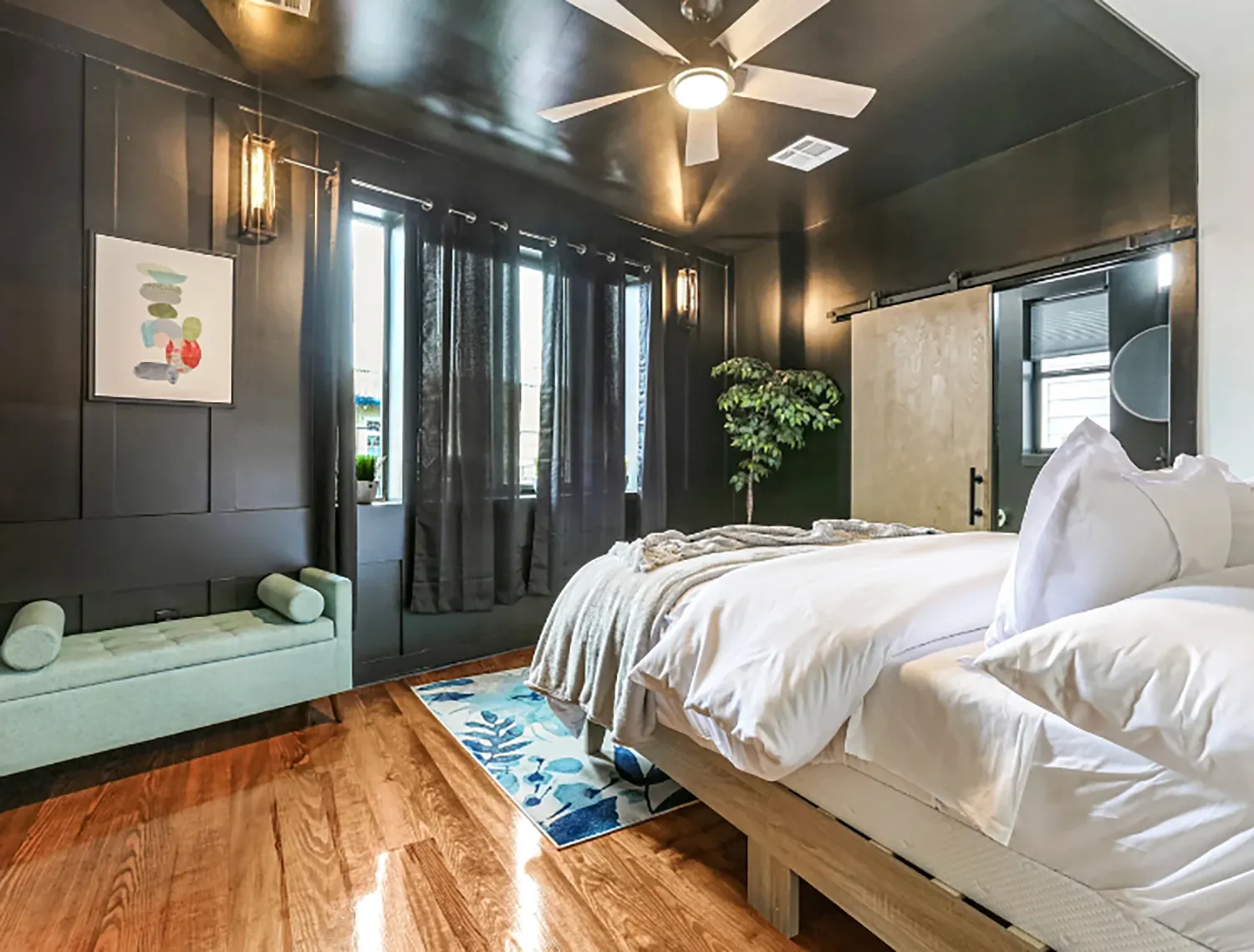 High-end bedroom with tasteful details in a luxury rental in New Orleans